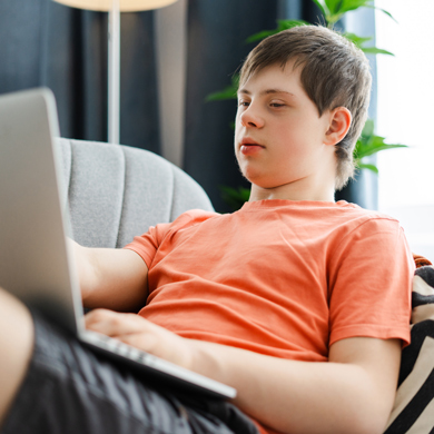 boy using laptop at home relaxing potential learning strategies with five important tips